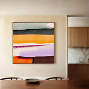 Abstract painting on a wall in a modern kitchen